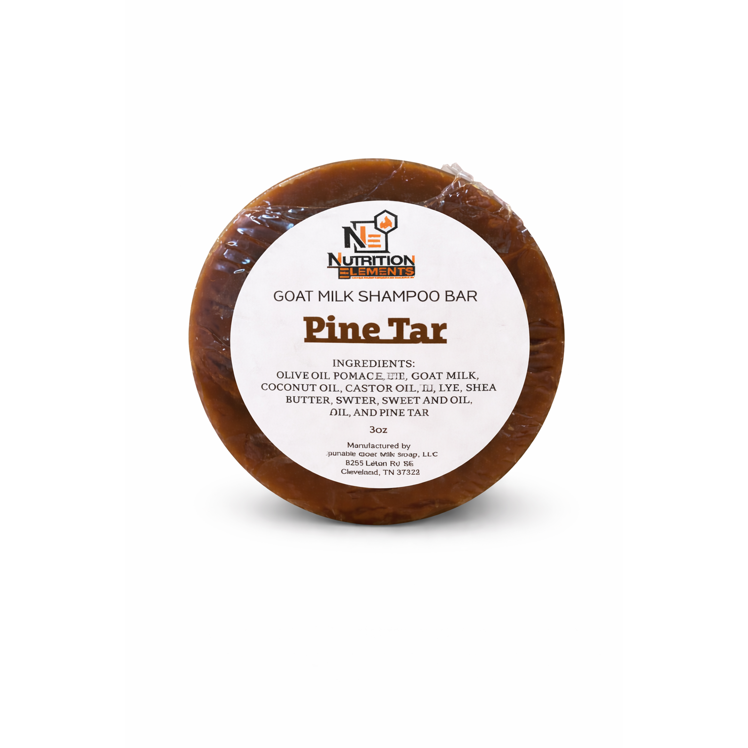 Goat milk shampoo bar with pine tar on a white background
